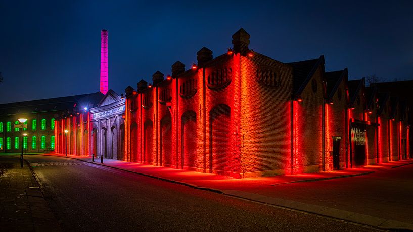 Illuminated exterior wall weaving museum Geldrop by Noud de Greef