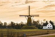 A Dutch Windmill with A yellow sky van Brian Morgan thumbnail