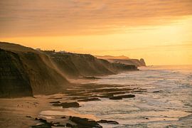 Portugal's coastal cliff with sea air at sunset by Leo Schindzielorz