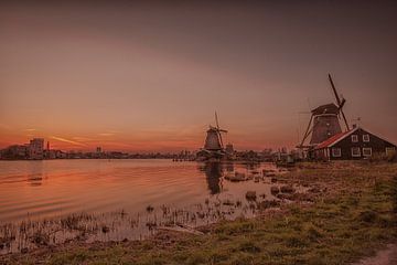 Sunset at the Windmills at the Zaanse Schans. by ingrid schot