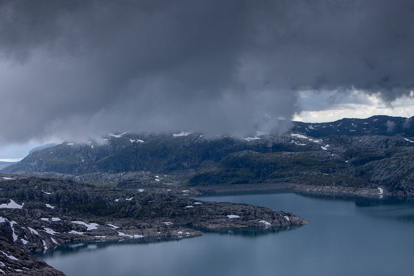 dramatic sky over a lake by Sebastian Stef