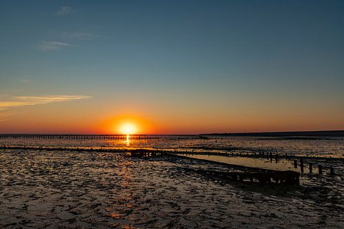 Wadden Sea, sunrise at Paesens Moddergat (Shipwreck of Wierum)