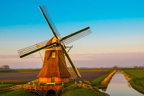 Dutch Windmill at Golden Sunset