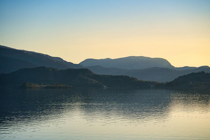 Western Cape in Norway. Fjord and sea with sunset and mountains on the coast by Martin Köbsch