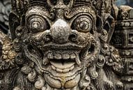 statue gods face hindu stone on bali indonesia by Dieter Walther thumbnail