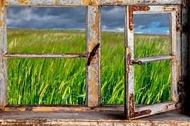 View from a rustic wooden window by Jürgen Wiesler
