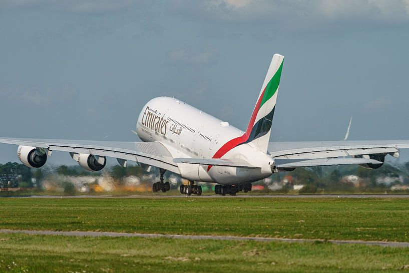An Emirates Airbus A380 takes off from Polderbaan. by Jaap van den Berg