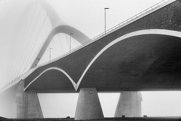 Detail of the construction of the bridge The Crossing in the fog