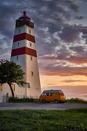 Surfers camp for the night under the Alnes Lighthouse on Godøy, Norway by qtx