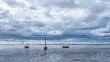 Boats on the tidal flats Ameland