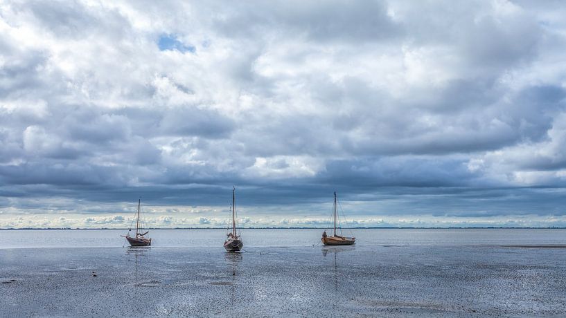 Boats on the tidal flats Ameland by R Smallenbroek