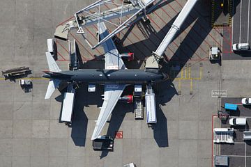 An Airbus stands at the G pier at Schiphol airport