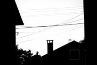 Monochrome Balloons Over City Silhouettes