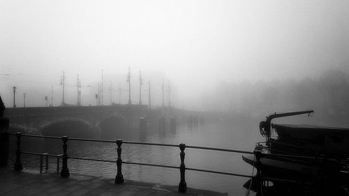Fog over the River Amstel near the Nieuwe Amstelbrug. by Don Fonzarelli
