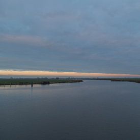 River at sunset von Piet Ritzema