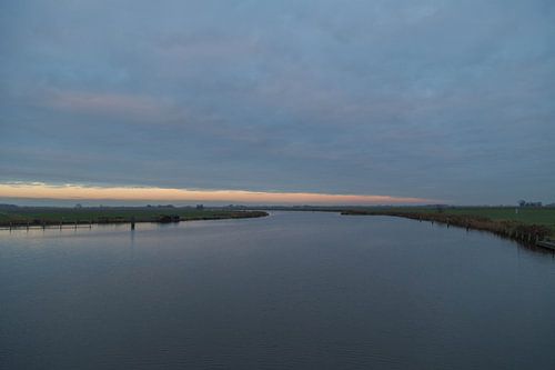 River at sunset by Piet Ritzema