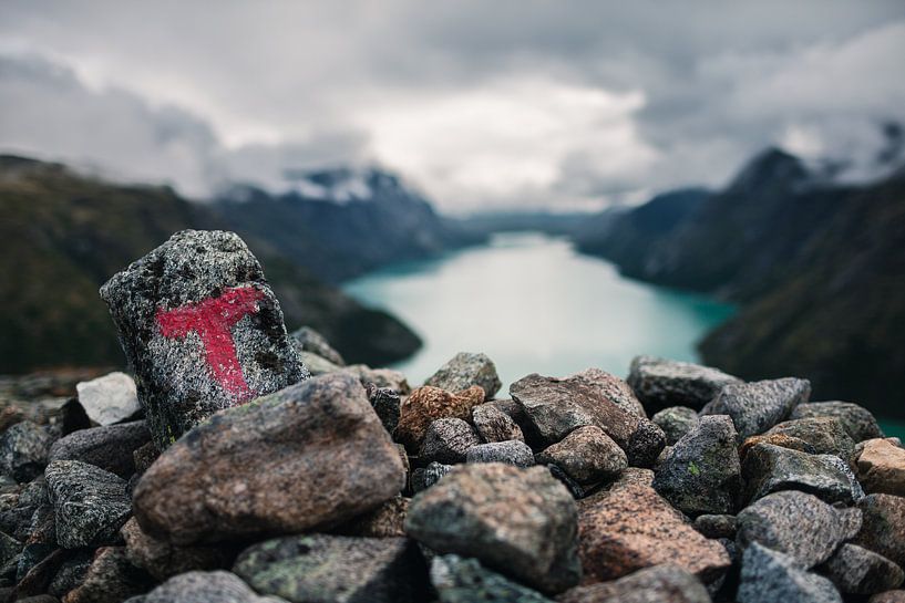 Stacked stones at a lookout point by Martijn Smeets