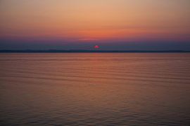 Sunset behind Copenhagen sur Leon van Voornveld