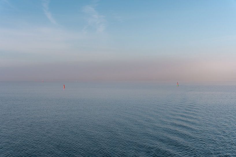 Foggy background with water (ijselmeer) and two buoys by Jolanda Aalbers