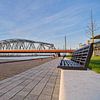 IJsselkade met bankje bij Oude IJsselbrug Zutphen van Henk van Blijderveen