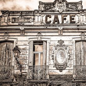 Facade of a café in Fleurance by okkofoto