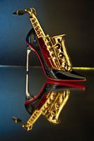 de drie S = seks, saxofoon, stoeckelschuhe (hoge hakken)