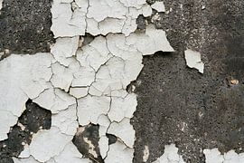 peeled white paint on a facade by Heiko Kueverling
