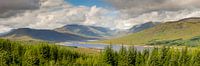 Panoramic view of Loch Loyne with hills and trees