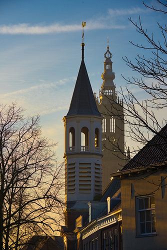 Sunrise illuminates the Elbow Church and the Tower of Our Lady