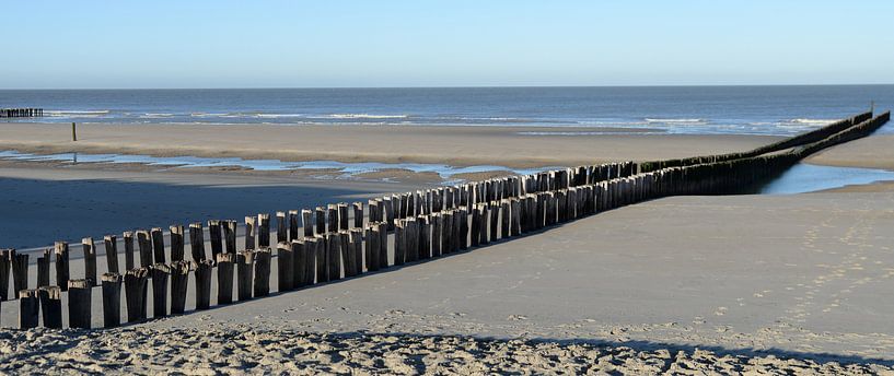 Beach with breakwaters near Domburg, the Netherlands by Rini Kools