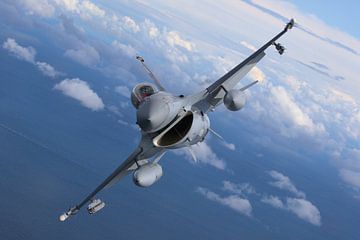 F-16 over sea by Sentry Aviation News