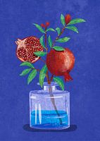 Granatapfelzweig in Vase