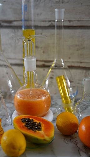 Papaya cocktail met rum, citroen en sinaasappel