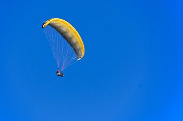 Paraglider and blue sky by Lars-Olof Nilsson