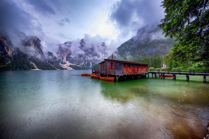 Boat house in the rain at Lago di Braies - Pragser Wildsee by Rene Siebring