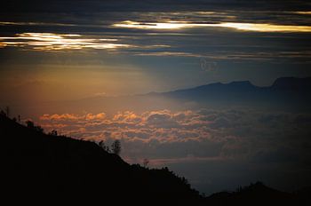 Indonesia, above the clouds amongst the volcanoes, sunrise
