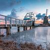 Sunset windmills Kinderdijk in winter by Mark den Boer