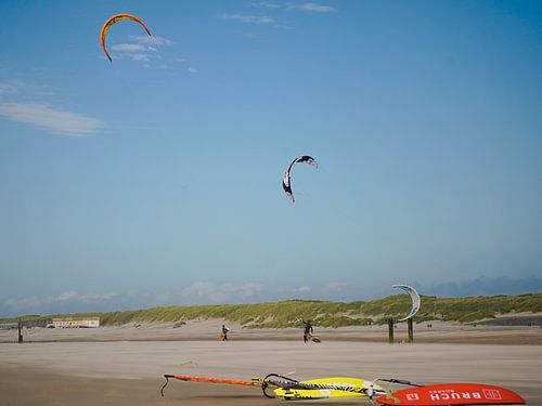 On the beach. Kite surfers.