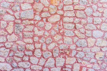 Mur de pierre avec fond en ciment rouge, texture, structure sur Alex Winter