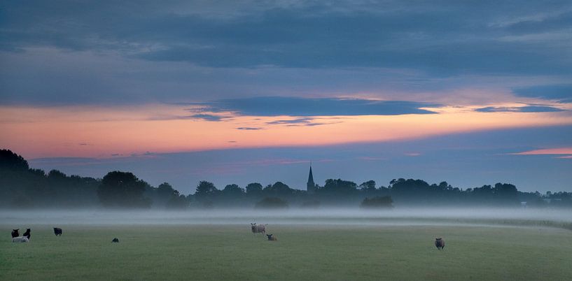 Early evening fog and the church tower of the Frisian village of Beetgum by Harrie Muis
