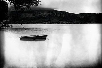 boat in Lake Annecy by Dennis Robroek