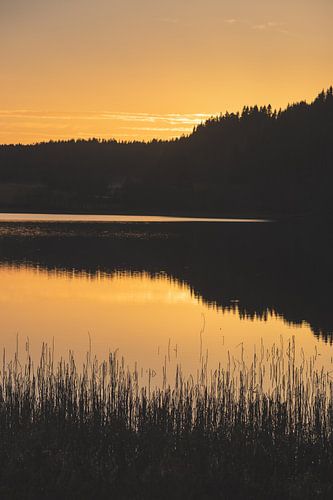 Calm has returned during this sunset at Lake Jonsvatnet, just outside Trondheim in Norway