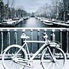 Fiets met sneeuw in Amsterdam van Thijs Friederich