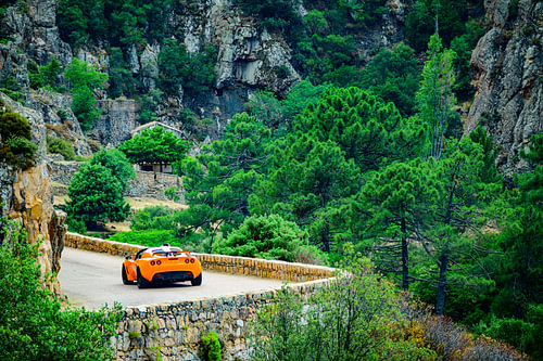 Lotus Exige sports car driving on Corsica island