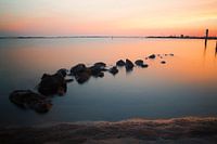 Zonsondergang aan het water