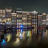 Het Damrak Amsterdam van Riccardo van Iersel