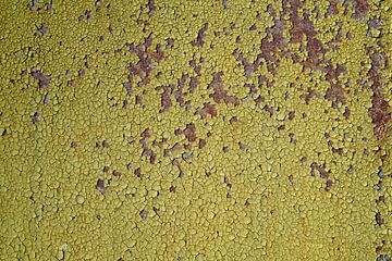 Peeling paint on rusty metal by Heiko Kueverling