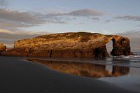 Playa de Las Catedrales - Rock in blue sea, with sunrise, in the north of Spain