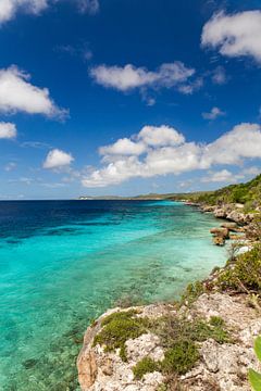 De blauwe zee rond Bonaire van Bas de Glopper