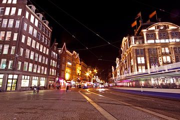 Dam Square in Amsterdam at night in the Netherlands by Eye on You